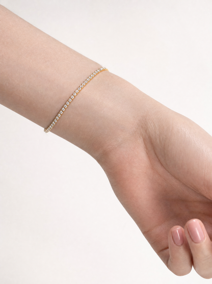 Womens dainty tennis bracelet on model, close crop