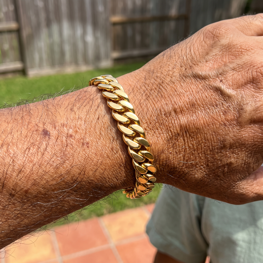 Older man wearing an 18K gold plated Saphir Miami Cuban link bracelet, waterproof