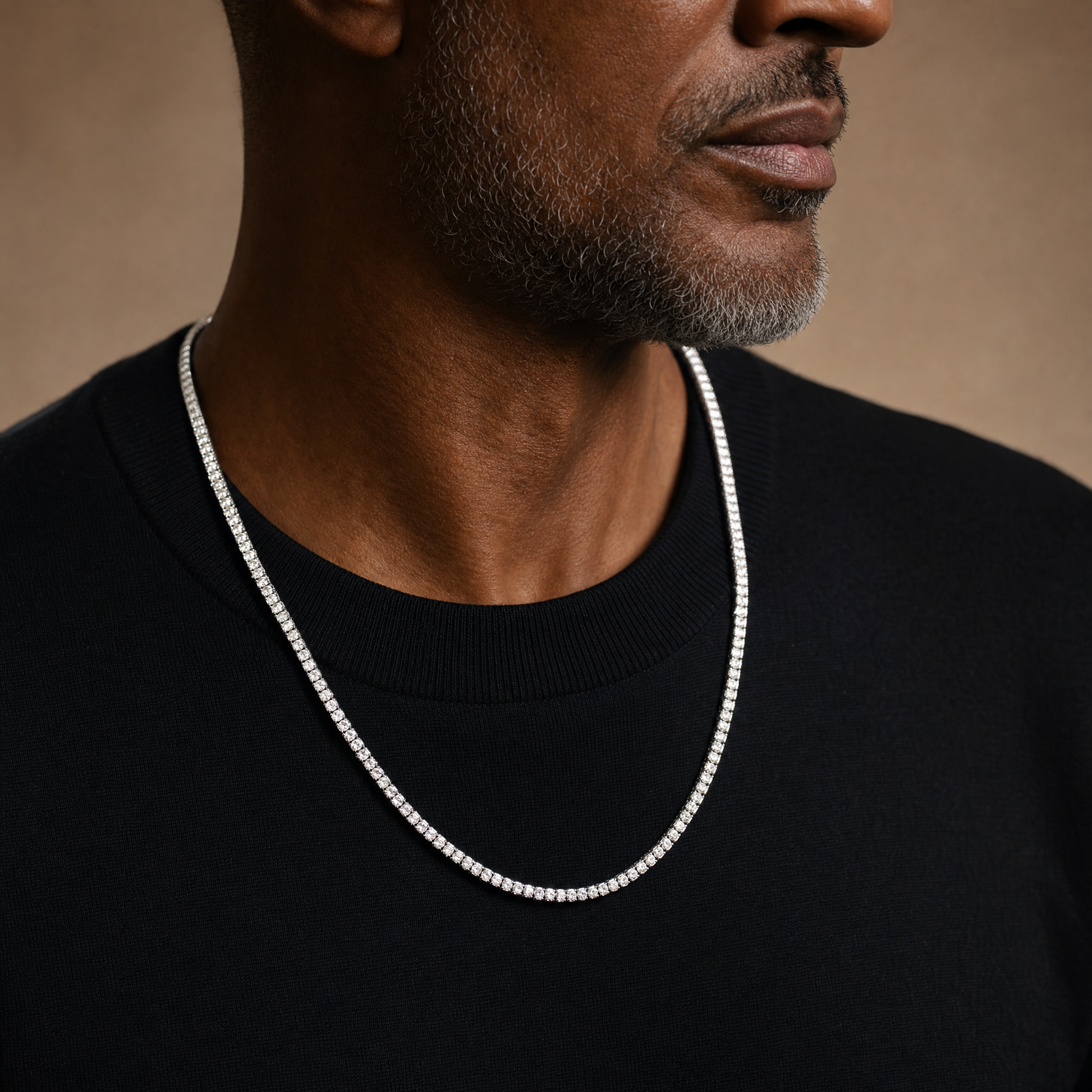 Simulated diamond tennis chain in silver, three-quarter angle on model