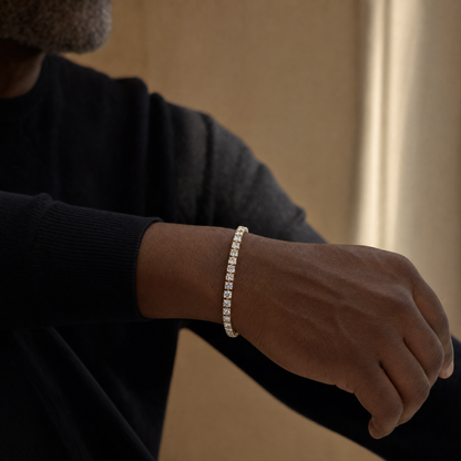 18K gold plated simulated diamond tennis bracelet, worn with a black crewneck