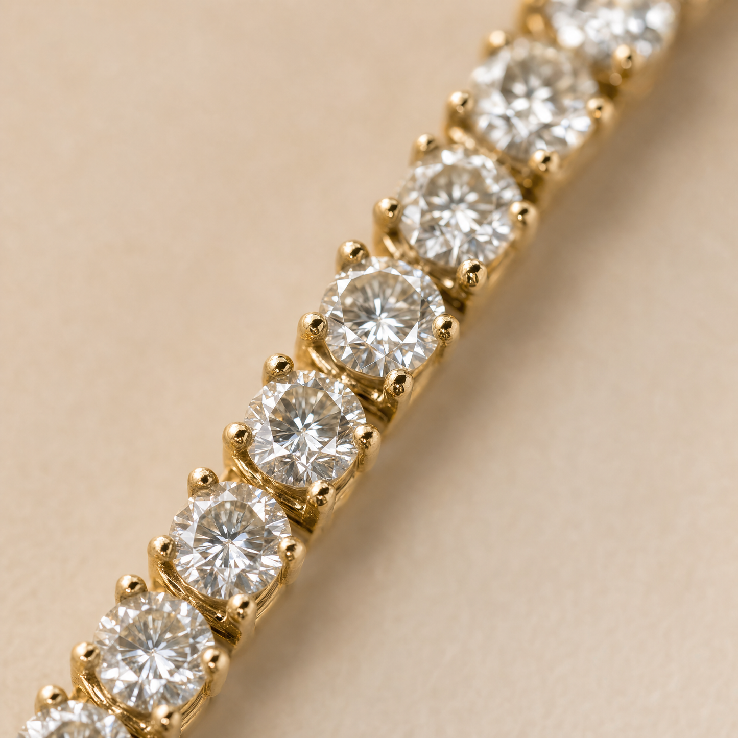 Close-up of 18K gold plated simulated diamond tennis bracelet prongs and stones