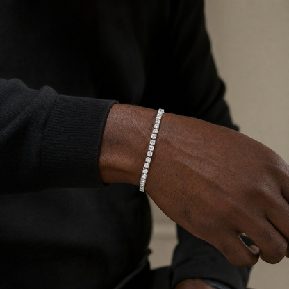 Simulated diamond tennis bracelet in silver, worn with a black crewneck