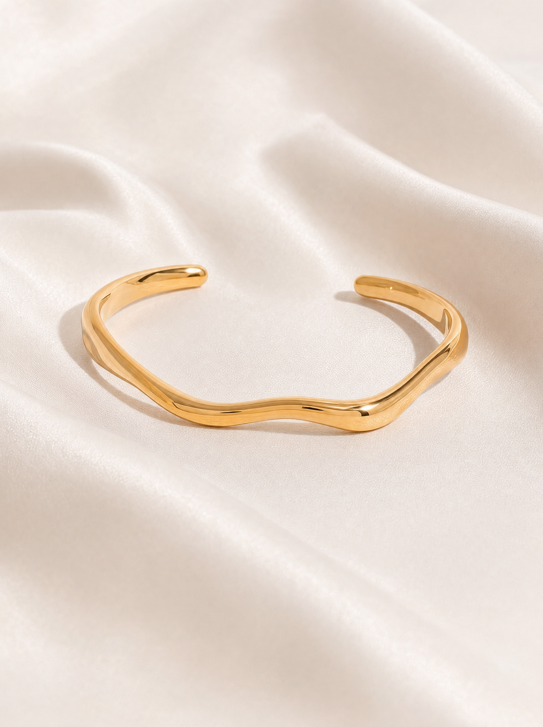 Wavy open cuff bracelet, 18K gold plated, flat lay detail